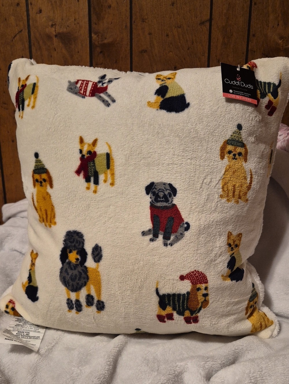 Cuddl Duds Cream Pillow with Multicolor Dog Motifs